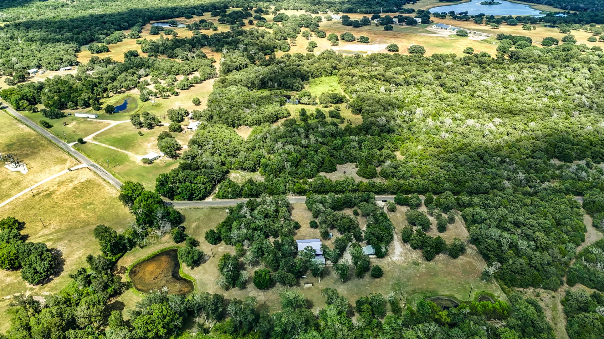 High aerial showing the property's setting in the Independence, Texas countryside